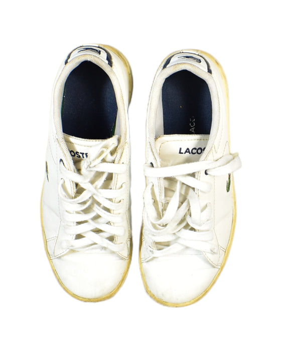 A White Sneakers from Lacoste in size 7Y for boy. (Back View)