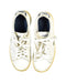 A White Sneakers from Lacoste in size 7Y for boy. (Back View)