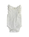 A White Bodysuits from With Love for Kids in size 6-12M for girl. (Front View)