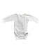 A White Long Sleeve Bodysuits from Petit Bateau in size Newborn for boy. (Front View)