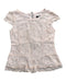 A Ivory Short Sleeve Tops from DKNY in size 6T for girl. (Front View)