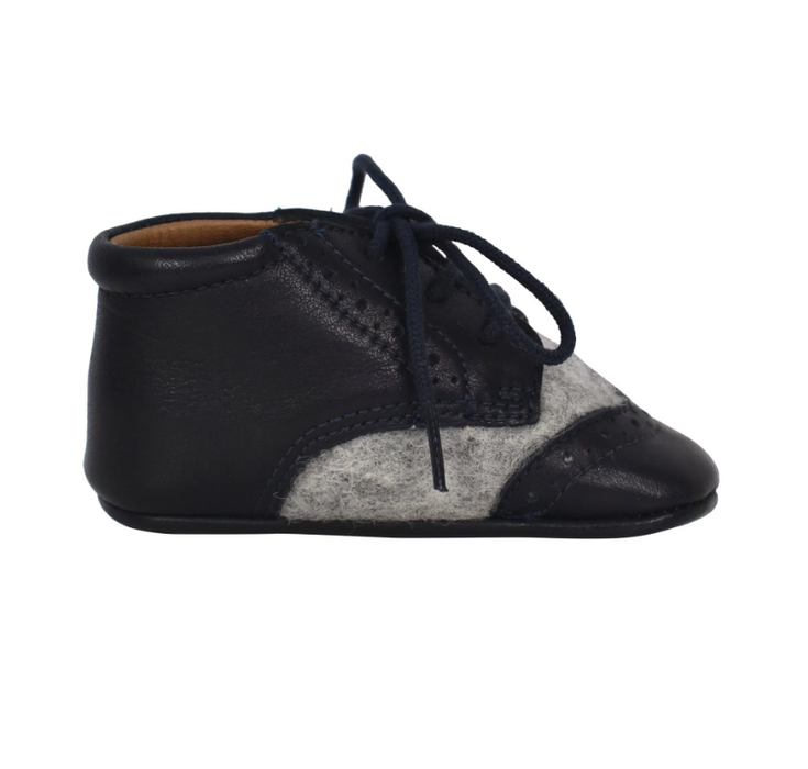 A Navy Boots & Booties from Pom d’Api in size 6-12M for boy. (Front View)