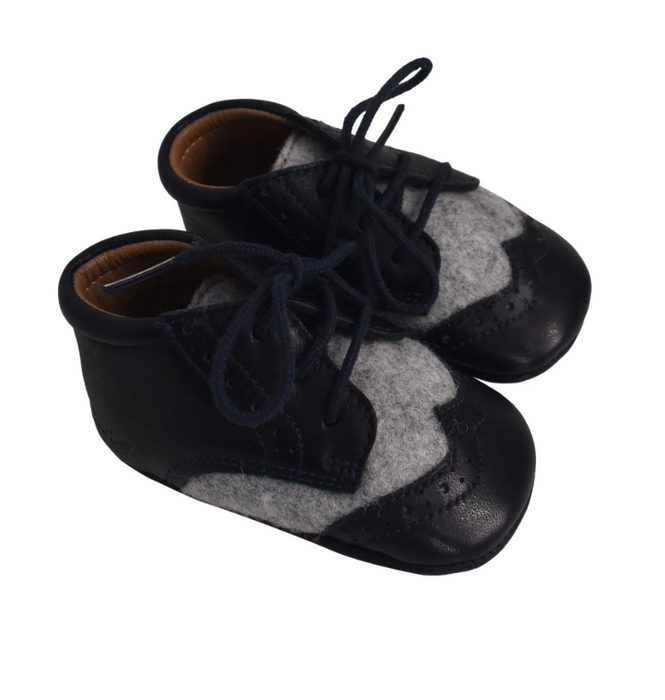 A Navy Boots & Booties from Pom d’Api in size 6-12M for boy. (Back View)