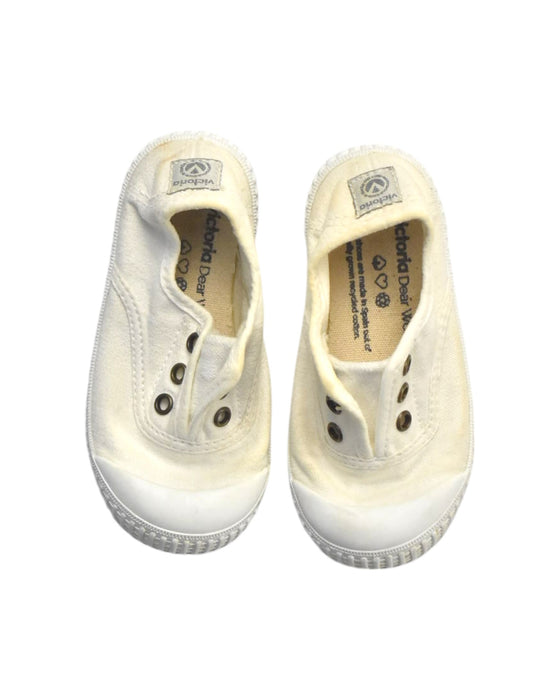 A Ivory Slip Ons from Victoria in size 3T for girl. (Back View)