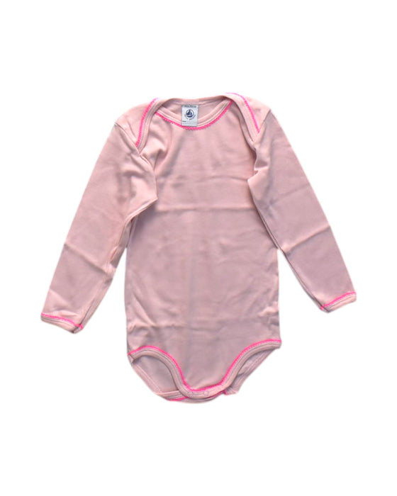 A Pink Long Sleeve Bodysuits from Petit Bateau in size 2T for girl. (Front View)