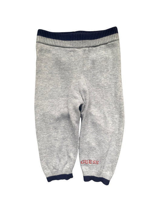 A Grey Casual Pants from Guess in size 6-12M for boy. (Front View)