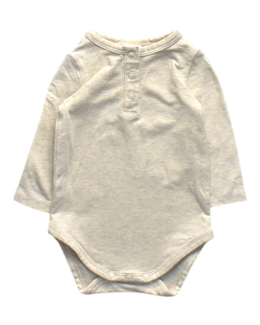 A Ivory Long Sleeve Bodysuits from Seed in size 0-3M for girl. (Front View)