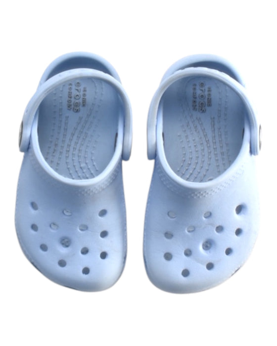 A Blue Slip Ons from Crocs in size 12-18M for boy. (Back View)