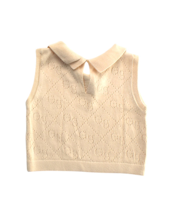 A Ivory Sleeveless Tops from Mori in size 3-6M for girl. (Back View)