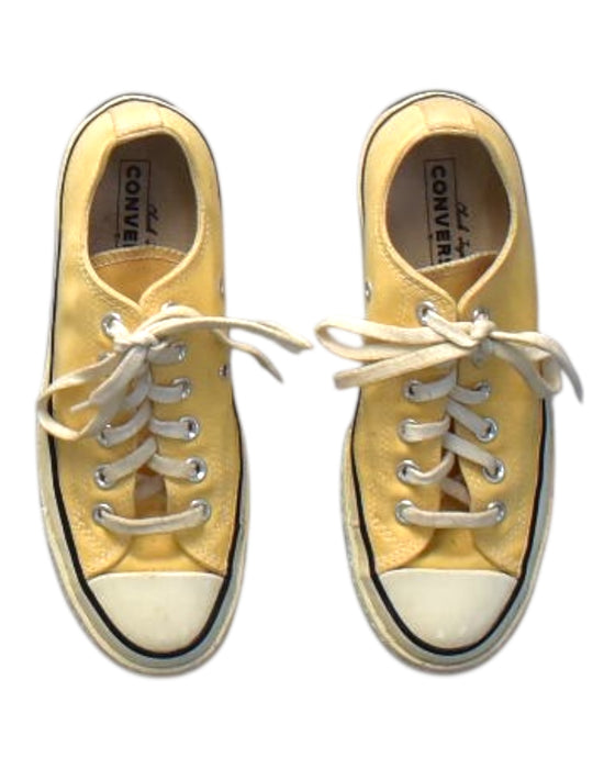 A Yellow Sneakers from Converse in size 12Y for boy. (Back View)