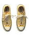 A Yellow Sneakers from Converse in size 12Y for boy. (Back View)