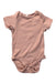 A Pink Short Sleeve Bodysuits from Mori in size Newborn for girl. (Front View)