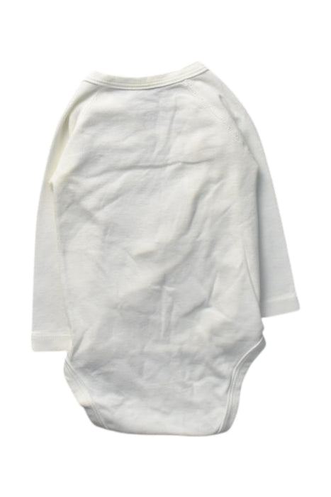 A White Long Sleeve Bodysuits from Petit Bateau in size 3-6M for girl. (Back View)