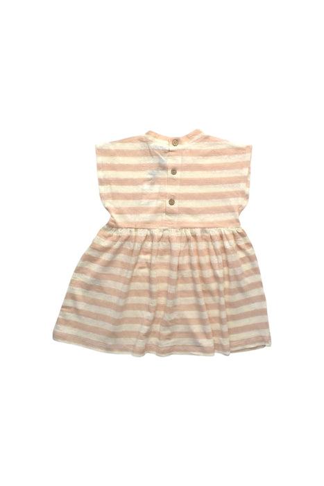 A Beige Short Sleeve Dresses from 1 + in the family in size 4T for girl. (Back View)