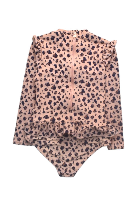 A Peach Swimsuits from Liewood in size 4T for girl. (Back View)