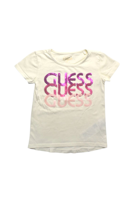 A White Short Sleeve T Shirts from Guess in size 5T for girl. (Front View)