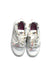 A White Sneakers from Adidas in size 6T for girl. (Back View)
