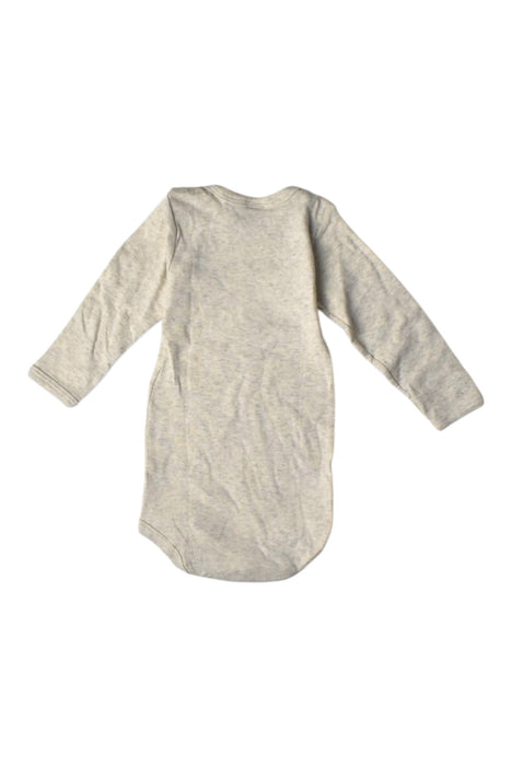 A Ivory Long Sleeve Bodysuits from Petit Bateau in size 6-12M for girl. (Back View)