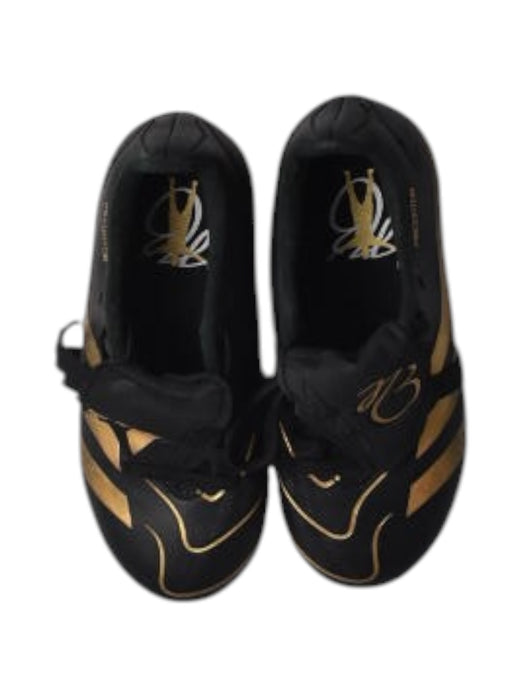A Black Cleats/Soccer Shoes from Adidas in size 6T for boy. (Back View)