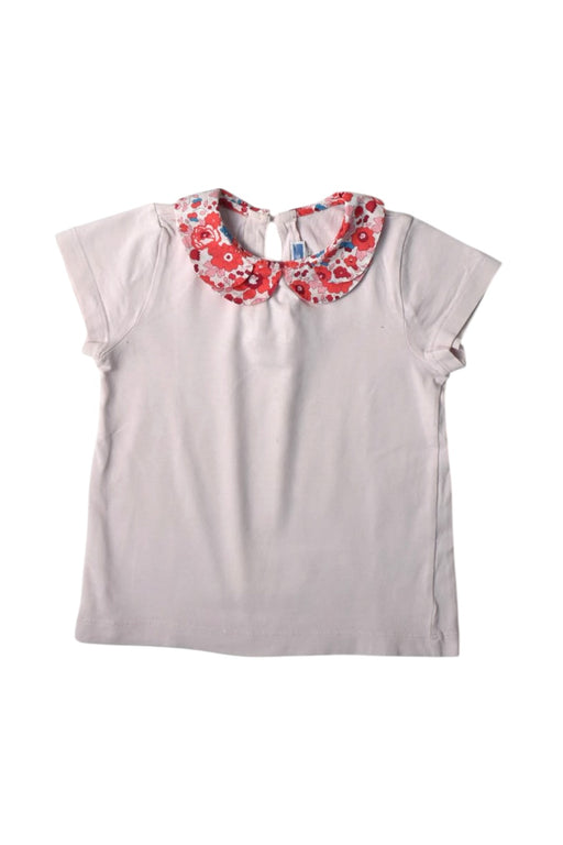 A White Short Sleeve Tops from Jacadi in size 4T for girl. (Front View)