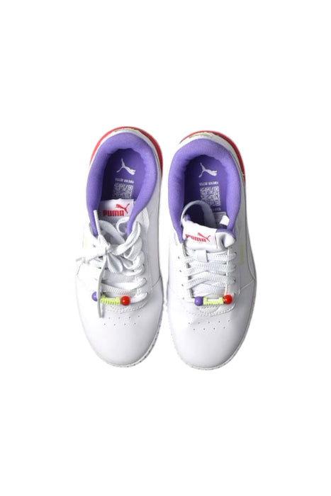A White Sneakers from Puma in size 11Y for girl. (Back View)