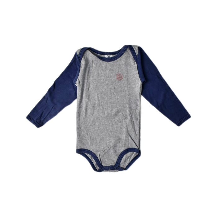 A Grey Long Sleeve Bodysuits from Petit Bateau in size 12-18M for boy. (Front View)