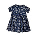 A Navy Short Sleeve Dresses from Petit Bateau in size 6T for girl. (Back View)