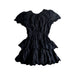 A Black Short Sleeve Dresses from Seed in size 8Y for girl. (Back View)