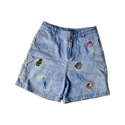 A Blue Shorts from Kenzo in size 10Y for girl. (Front View)