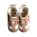 A White Sneakers from Onitsuka Tiger in size 4T for boy. (Back View)