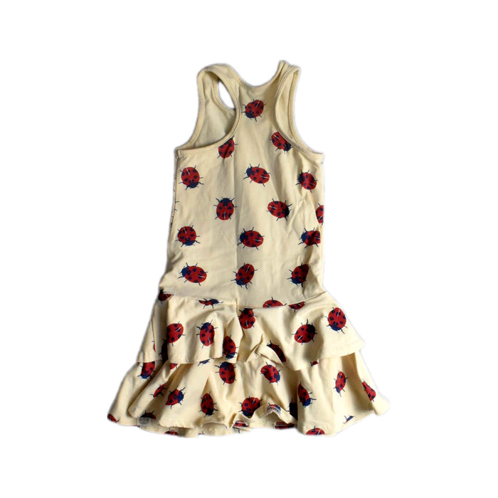 A Ivory Sleeveless Dresses from Le Petit Society in size 4T for girl. (Back View)
