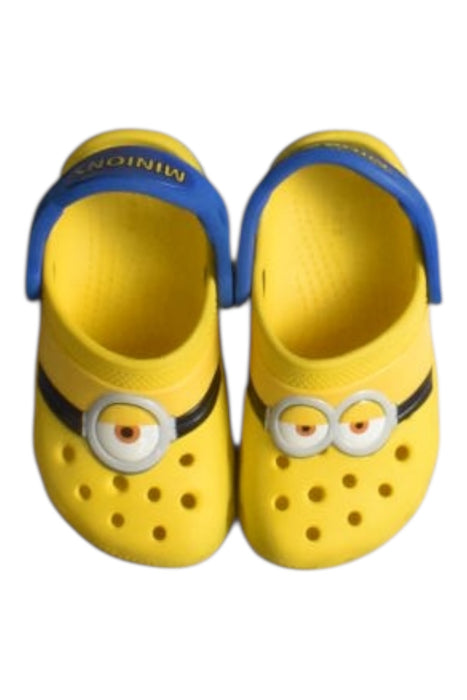 A Yellow Slip Ons from Crocs in size 3T for neutral. (Back View)