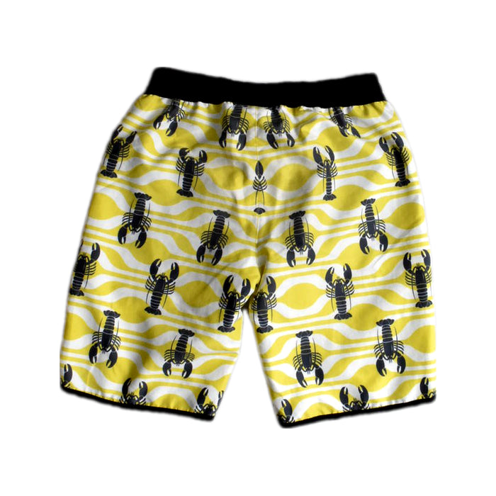 A Yellow Swim Shorts from Sandy Feet Australia in size 8Y for boy. (Back View)