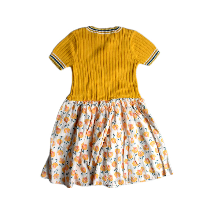 A Yellow Short Sleeve Dresses from Gingersnaps in size 6T for girl. (Back View)
