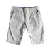 A White Shorts from Petit Bateau in size 5T for boy. (Front View)