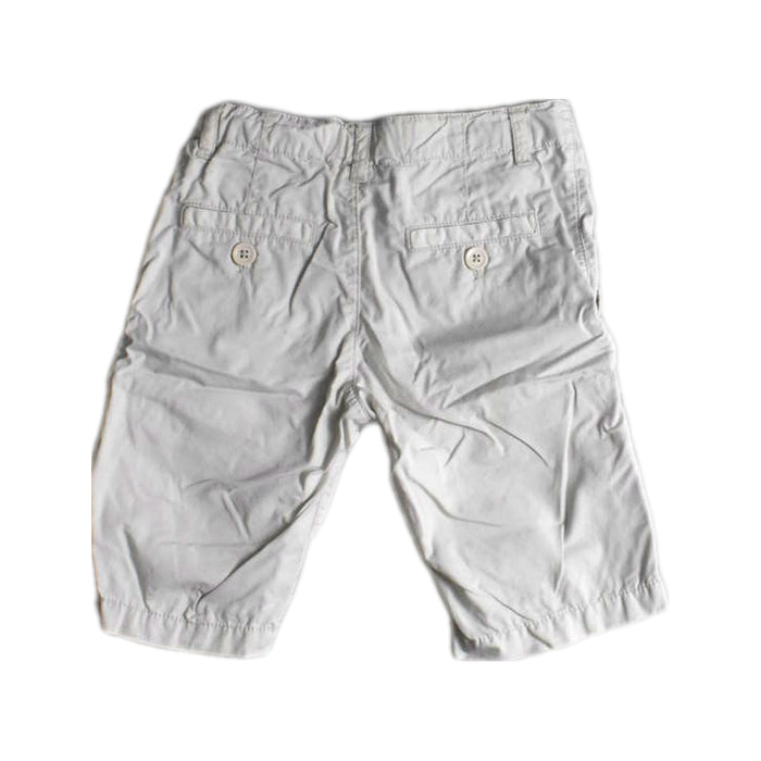 A White Shorts from Petit Bateau in size 5T for boy. (Back View)