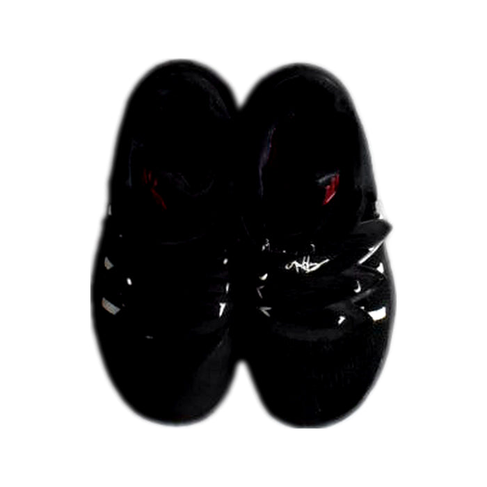 A Black Sneakers from Nike in size 5T for boy. (Back View)