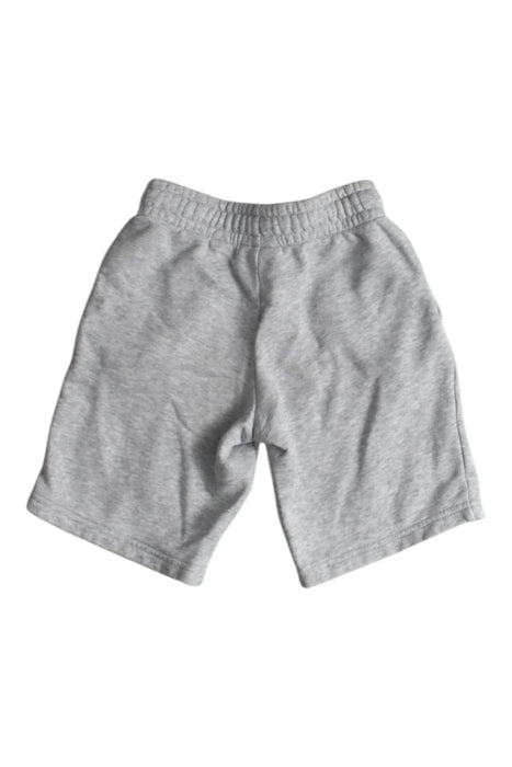 A Grey Shorts from Lacoste in size 6T for boy. (Back View)