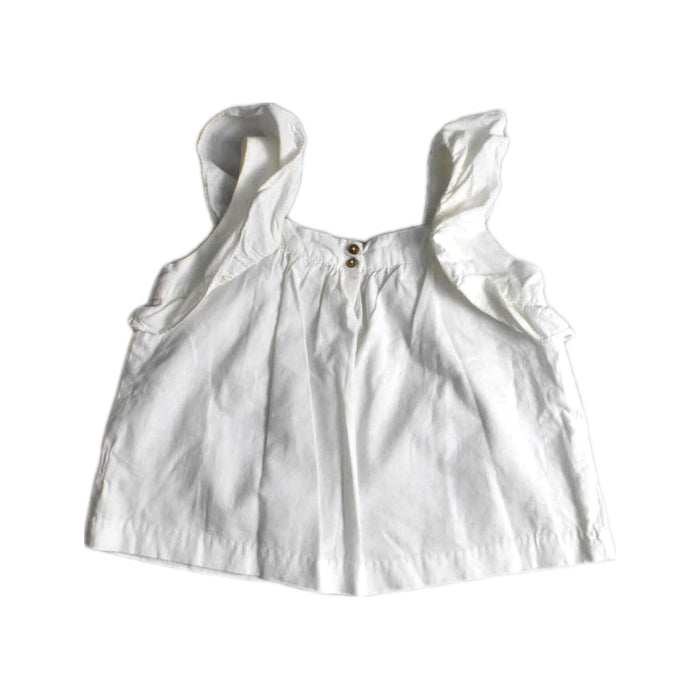 A White Sleeveless Tops from Château de Sable in size 6T for girl. (Back View)