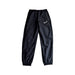 A Black Active Pants from Nike in size 12Y for neutral. (Front View)