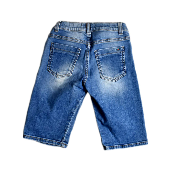 A Blue Jeans from Gucci in size 8Y for boy. (Back View)