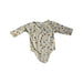 A Ivory Long Sleeve Bodysuits from Mori in size 6-12M for girl. (Front View)