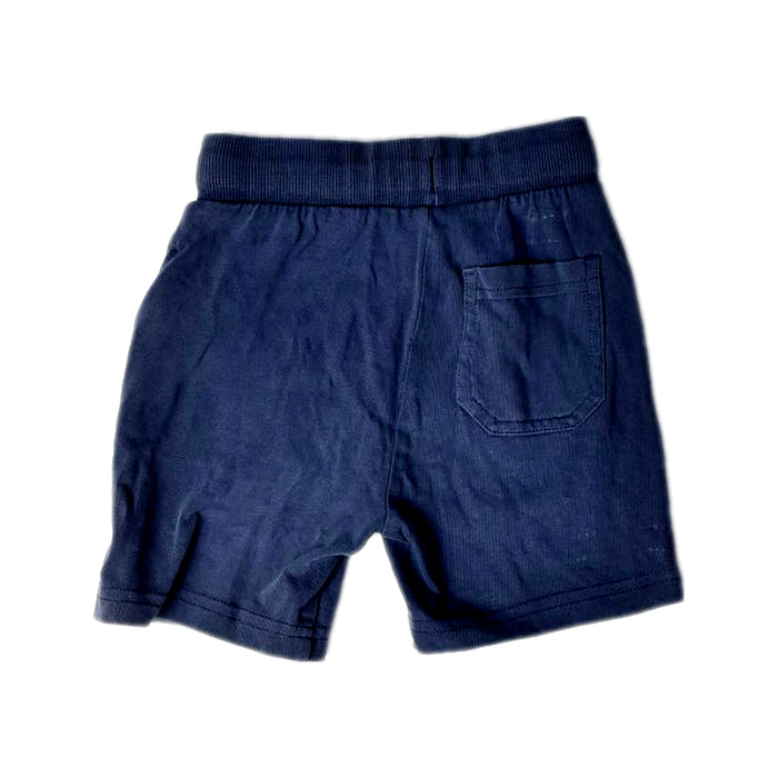A Navy Shorts from Mothercare in size 12-18M for boy. (Back View)