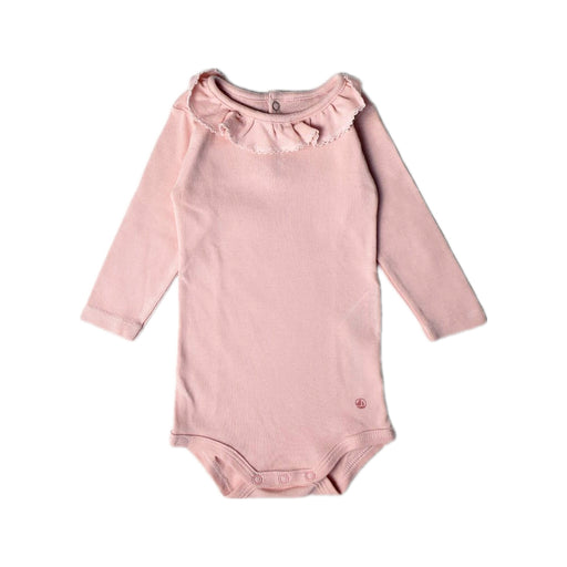 A Pink Long Sleeve Bodysuits from Petit Bateau in size 0-3M for girl. (Front View)