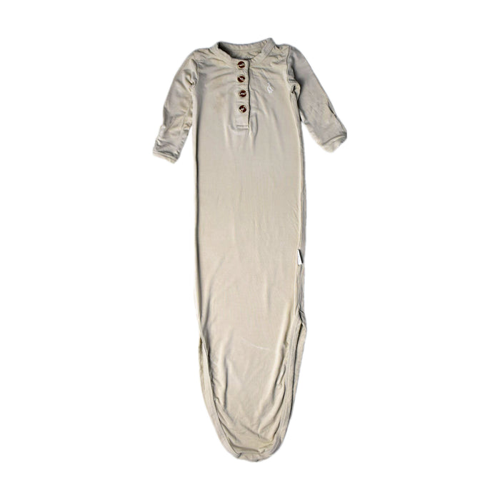 A Beige Onesies from Raph and Remy in size 0-3M for neutral. (Front View)