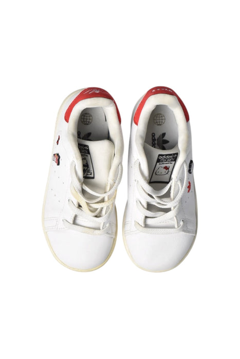 A White Sneakers from Adidas in size 4T for girl. (Back View)