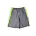 A Green Shorts from Under Armour in size 14Y for boy. (Front View)