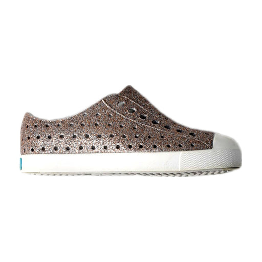 A Silver Slip Ons from Native Shoes in size 4T for girl. (Front View)