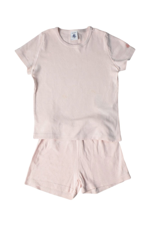 A Pink Pyjama Sets from Petit Bateau in size 4T for girl. (Front View)