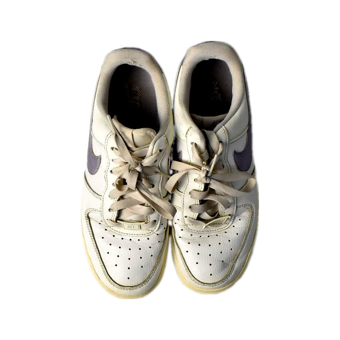 A White Sneakers from Nike in size 12Y for girl. (Back View)